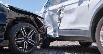 Damaged cars in accident after collision on city street. Subrogation in Insurance.