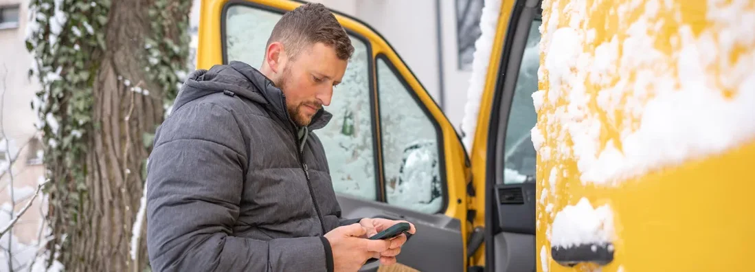 Preparing to do some delivery on a cold and snowy day. Michigan Commercial Vehicle Insurance. 