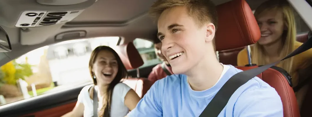 Teenagers driving in car. Find Tempe, Arizona car insurance.