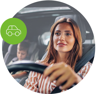 Mom Driving Son to School in Car for Back to School Season. Find Auto Coverage Types.