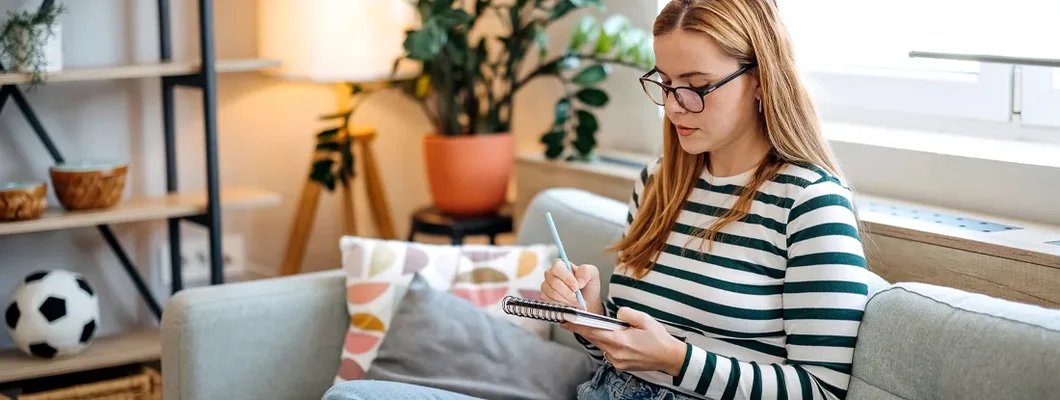 Woman spends her free time at home drawing. Should I rent or buy a condo?