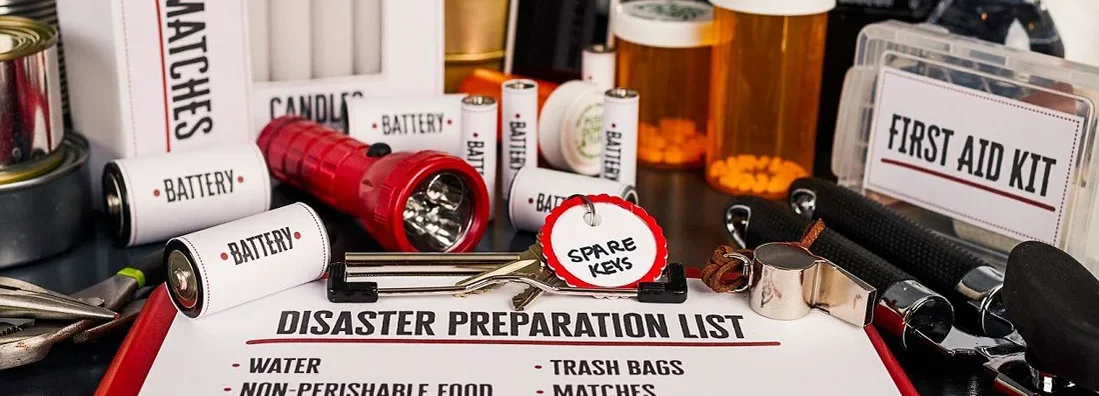 Collection of items for disaster preparedness and emergency planning. 6 Must-Know Steps to Prep Your Business for a Natural Disaster.