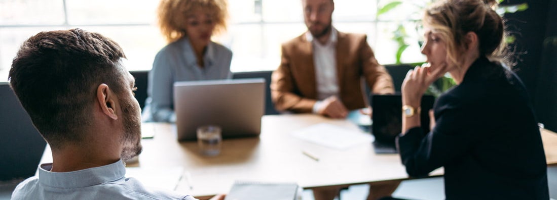 Group of business people in a meeting. How to Find the Best Business Insurance in Upper Arlington, Ohio.