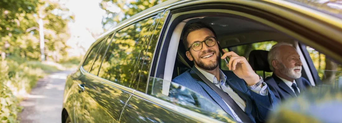 Business colleagues traveling to a business meeting together. How to Find the Best Car Insurance Coverage in Biddeford, Maine. 