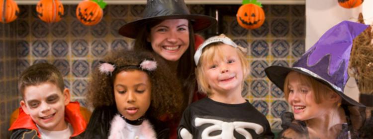 Mother and kids enjoying Halloween