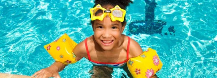 Little girl practicing pool safty