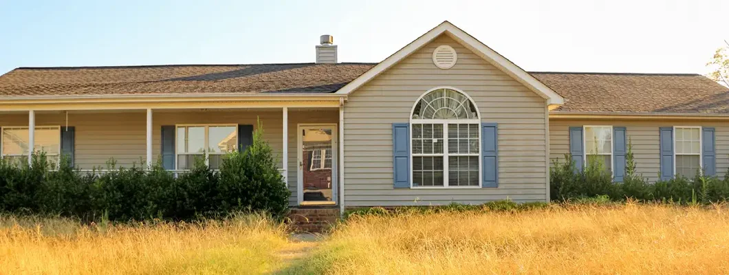 Unkempt Property of Foreclosed Working Class Ranch Style Home. How to Buy a House in Foreclosure. 