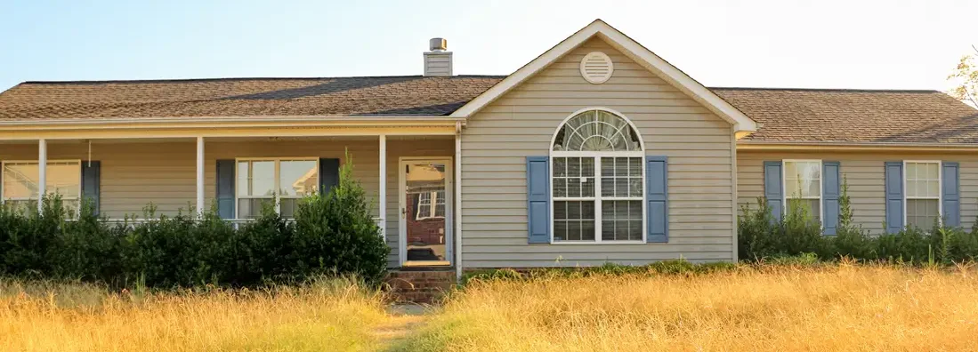 Unkempt Property of Foreclosed Working Class Ranch Style Home. How to Buy a House in Foreclosure. 