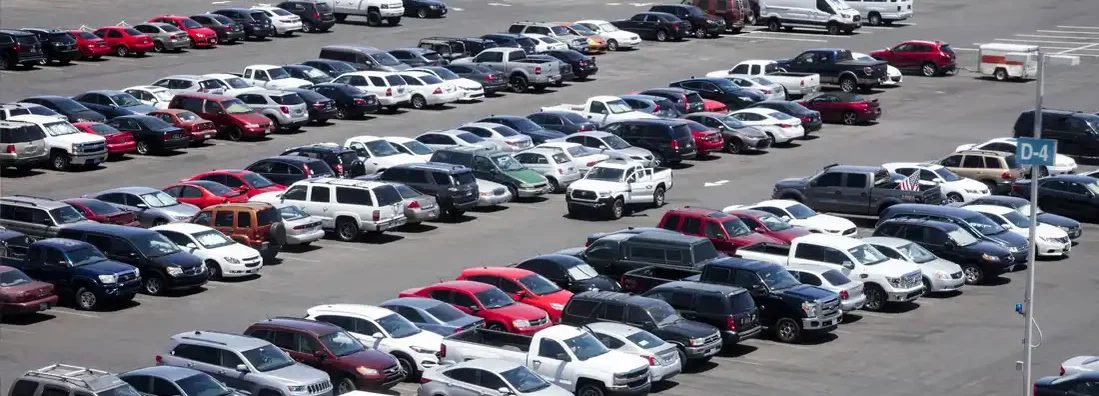 Cars Parked in Parking Lot. Buying a car at auction.