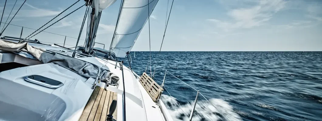 Sailing with sailboat. Find what you should be paying for boat insurance coverage.