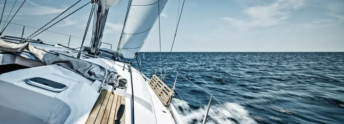 Sailing with sailboat. Find what you should be paying for boat insurance coverage.
