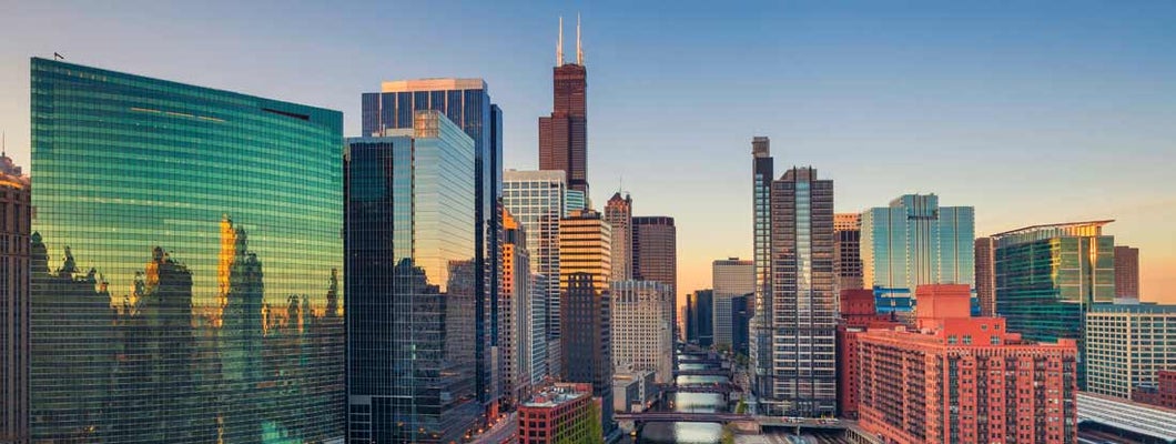 Cityscape image of Chicago downtown at sunrise. Find Chicago, Illinois business insurance.