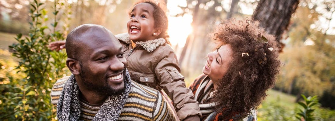 Happy parents having fun with their daughter at the park. What happens if you were denied life insurance?