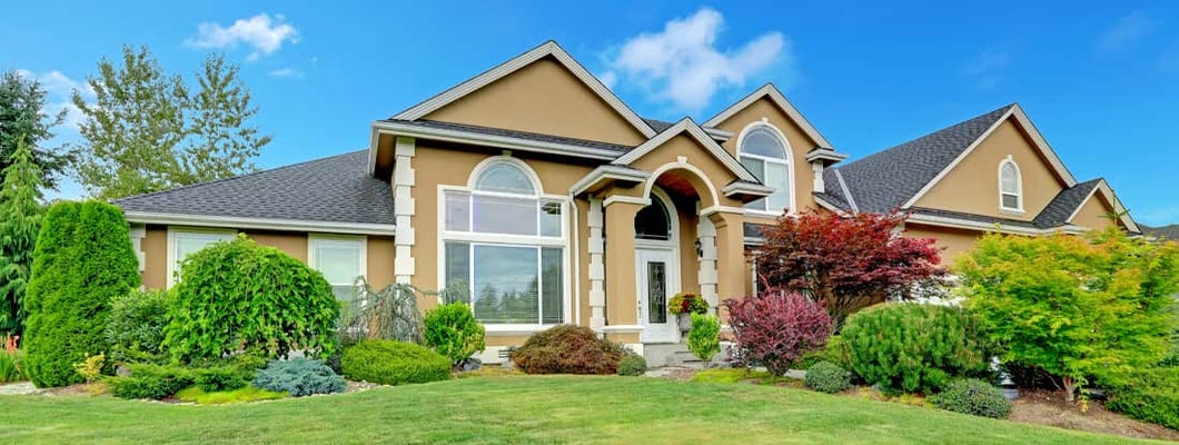 Beautiful house with landscape in Nebraska. How to Find the Best Homeowners Insurance Policy in La Vista, NE. 
