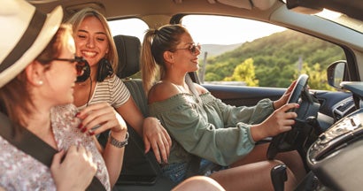 Three female friends travel together. When does insurance go down?