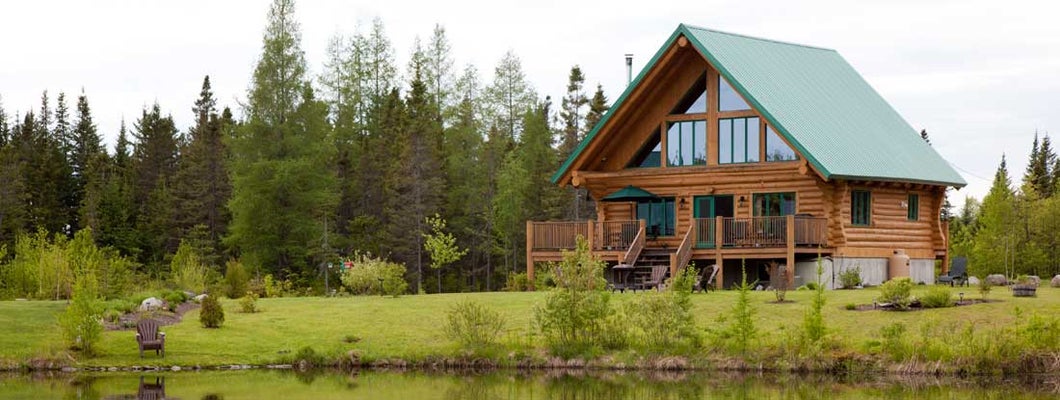 Beautiful log cabin on lake. How to insure a cabin.