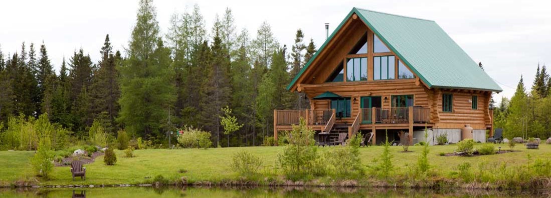 Beautiful log cabin on lake. How to insure a cabin.