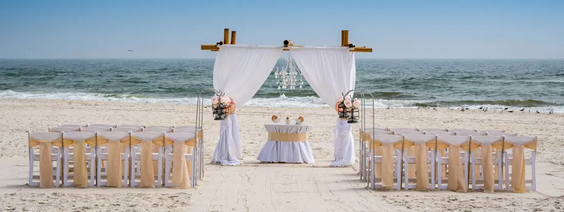 Beach wedding ceremony setup on the shores of Gulf Shores. Alabama Event Liability Insurance.