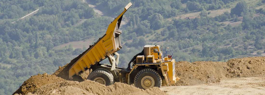 Dump truck moving dirt. Dump Truck Insurance.