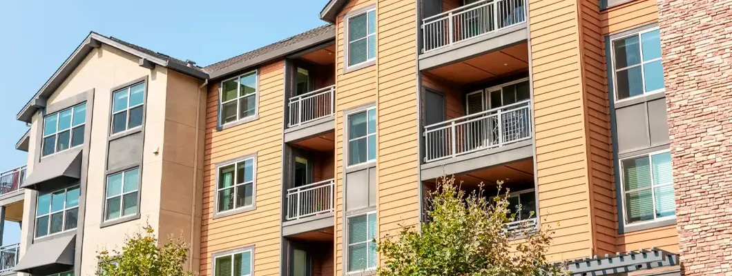 Exterior view of modern apartment building. Find Rhode Island condo insurance.