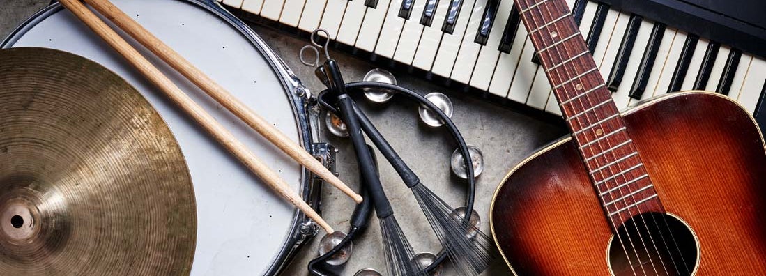 Group of musical instruments in music store. Find used music store insurance.