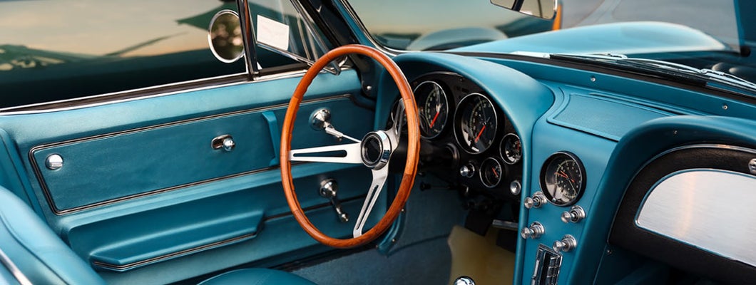 Classic retro vintage blue car. How to insure a classic car.