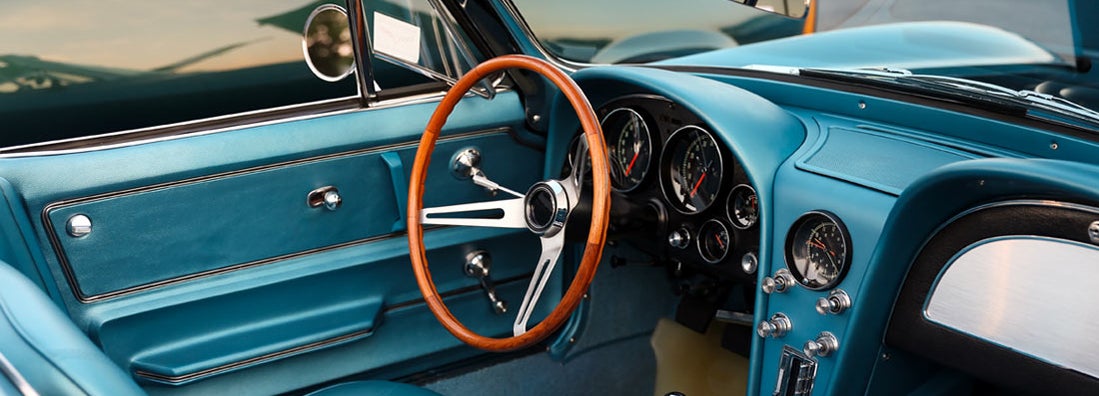 Classic retro vintage blue car. How to insure a classic car.