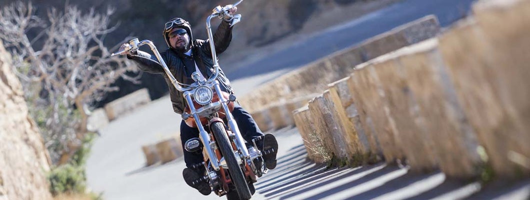 Man riding a chopper motorcycle. Why Chopper Insurance is Hard to Find.