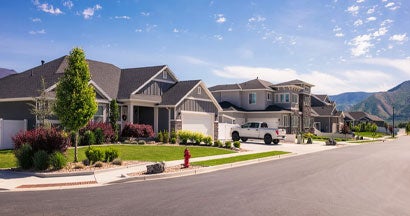 A street of modern houses in a development south of Salt Lake City in Utah. How to File Umbrella Insurance Claims.