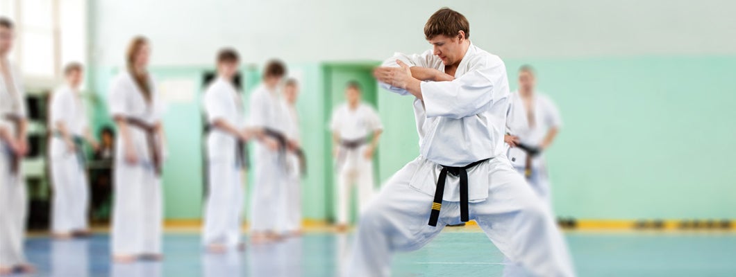 Lesson in karate school for adults and children