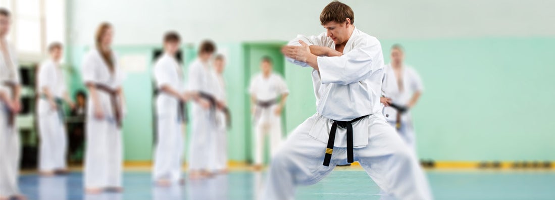 Lesson in karate school for adults and children