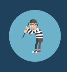 house with burglar in front breaking in