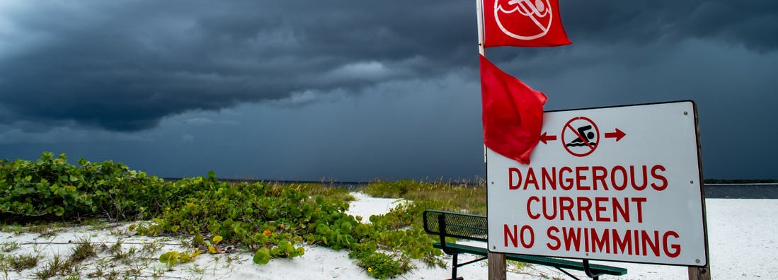 Tropical storm clouds gather off the Florida coast. Find Florida hurricane insurance.