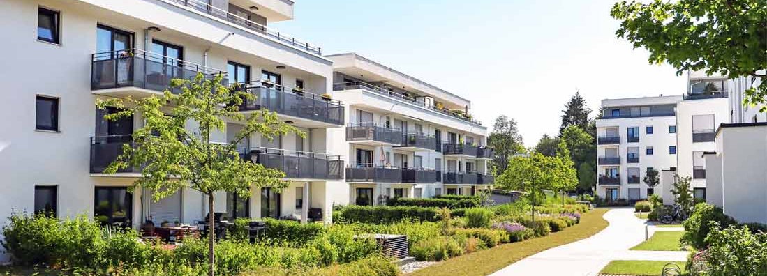 Residential area with apartment buildings in the city. HO4 Tenants Form.