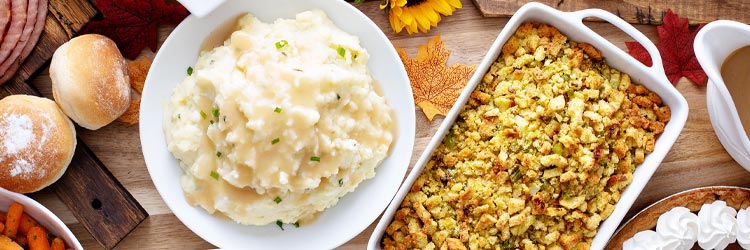 Thanksgiving table with mashed potatoes and stuffing