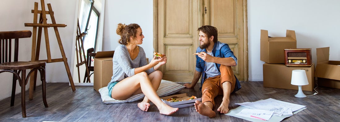 couple enjoying moving in to their first home