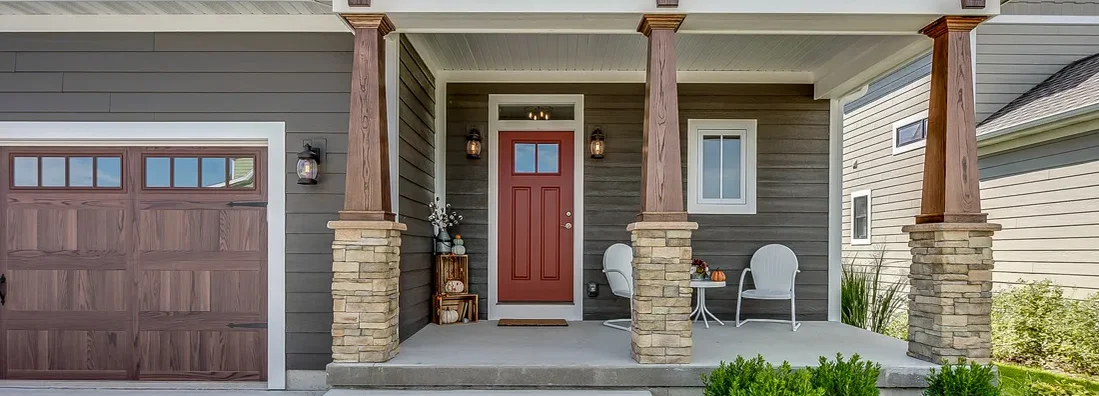 Three support columns on front porch of home. How to Find the Best Homeowners Insurance in Garden City, New York.