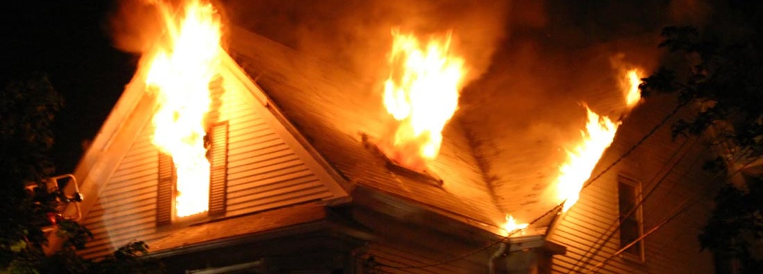 Burning house at night