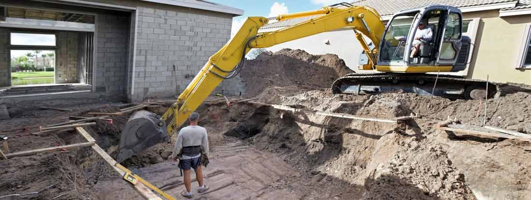 New cement swimming pool construction. Find Swimming Pool Contractor Insurance.