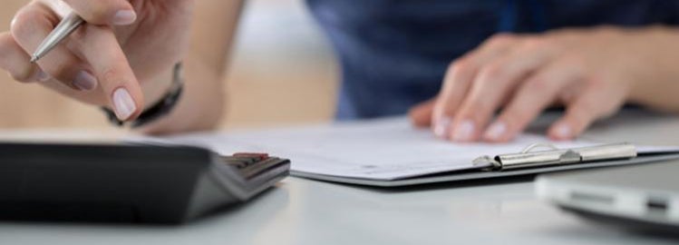 Woman calculating credit report