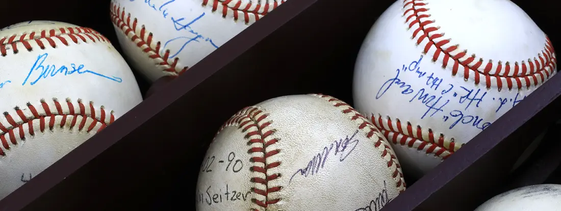 Baseball display with autographs. Does My Home Insurance Cover My Sports Collection?