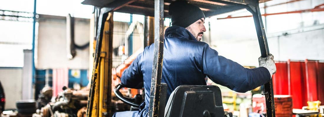 Man driving a forklift. If an employee tips over a forklift, who's responsible?