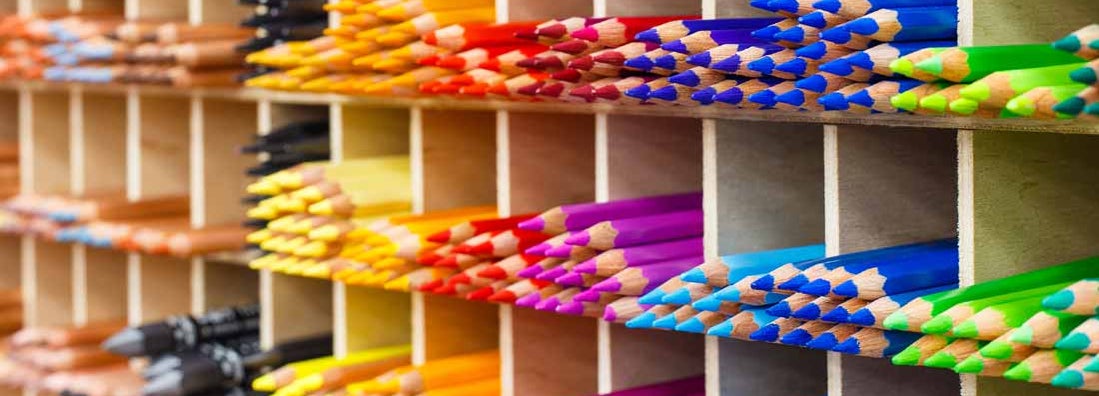 Multicolored pencils in art store closeup