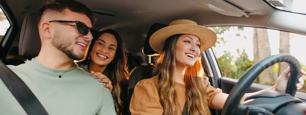 Happy friends traveling by car. How to Find Great Car Insurance at Competitive Price in Franklin, Tennessee.