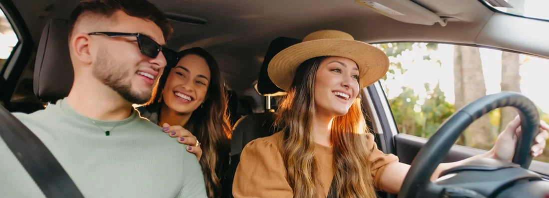 Happy friends traveling by car. How to Find Great Car Insurance at Competitive Price in Franklin, Tennessee.