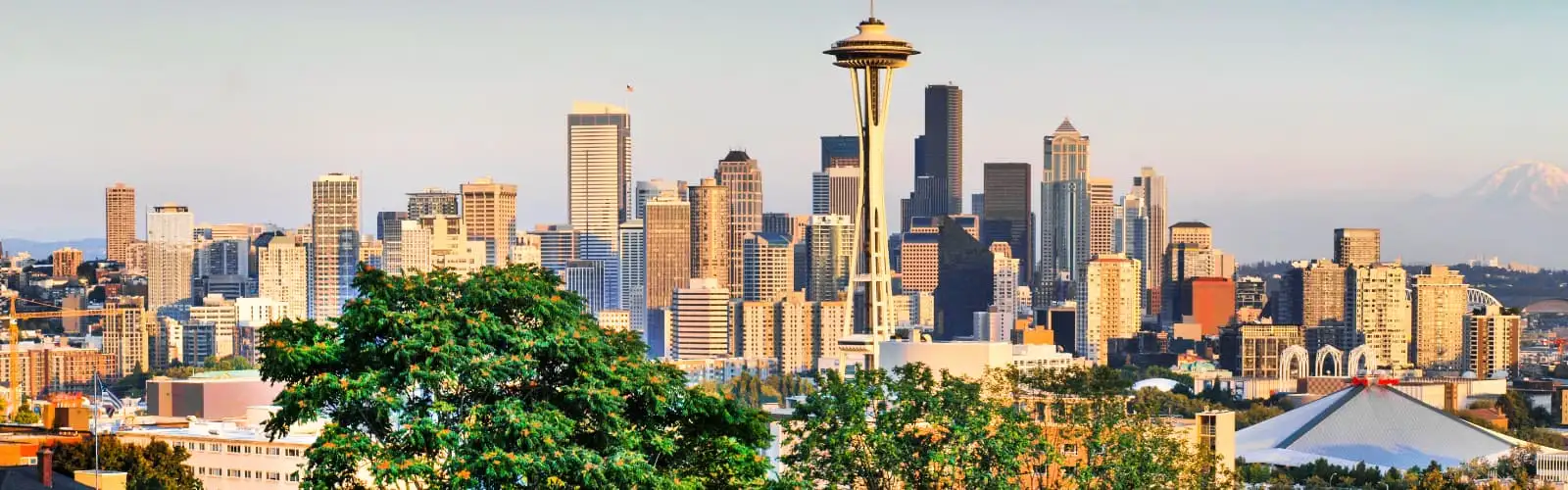 Seattle downtown skyline and Mt. Rainier, Washington. Find Washington insurance.
