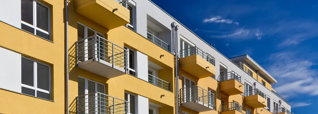 New modern apartment building with balconies. Find Lexington, Kentucky renters insurance.