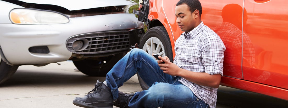 man contacting his insurance after accident