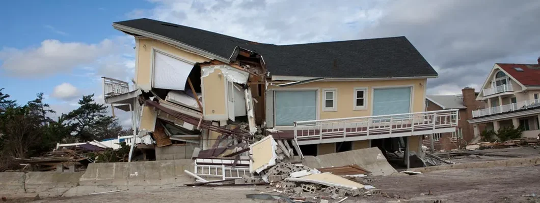 Damaged home after Hurricane Sandy. Find hurricane aftermath insurance.