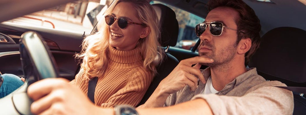 Couple is traveling in the car. Find Little Rock, Arkansas car insurance.